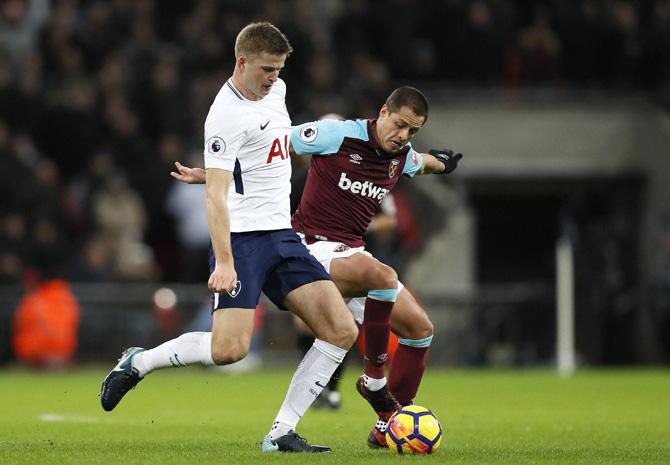 West Hams Javier Hernandez, right, vies for the ball with Tottenhams Eric Dier during the English Premier League soccer match between Tottenham Hotspur and West Ham United at Wembley Stadium in London, Thursday, Jan. 4, 2018. AP/PTI