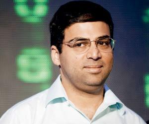 Viswanathan Anand interacts with blind chess players