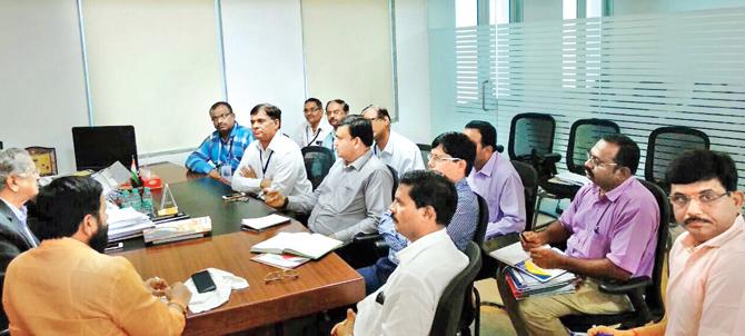 A delegation of Mahad villagers speaks to Minister for Industries and Mining Subhash Desai at his office in Mantralaya