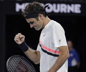 Roger Federer breezes through first round of Australian Open