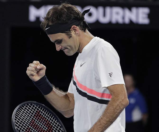 Roger Federer reacts after defeating Aljaz Bedene during first round match at the Australian Open. Pic/ AFP
