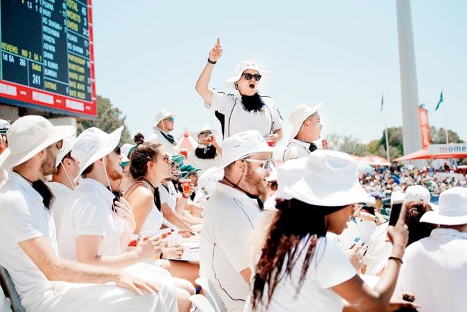  Fans enjoy the atmosphere on Day Two of the first Test between South Africa and India in Cape Town on Saturday. Pic/AFP