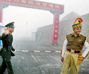 China: Border row must be resolved 'calmly'