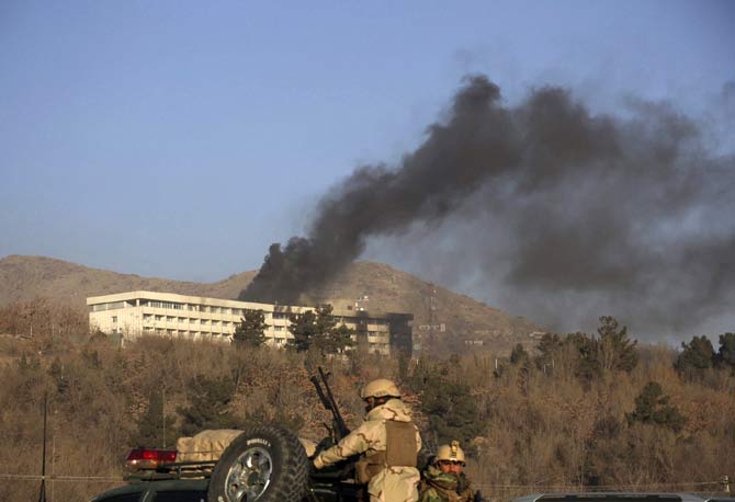 Black smoke rises from the Intercontinental Hotel after an attack in Kabul. Pic/ PTI