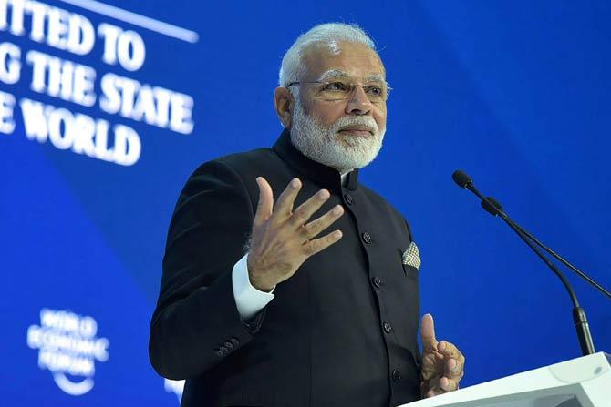 Prime Minister Narendra Modi delivers his speech at the plenary session of the World Economic Forum, in Davos. Pic/ PTI