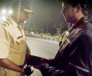 Sting video that went viral on social media exposes cop taking bribe from bikers