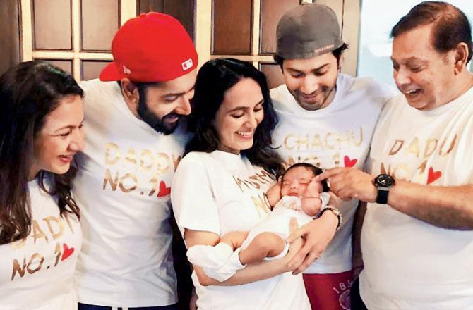 Varun Dhawan's niece: On July 11, 2018, Varun provided the first glimpse of the one-month-old niece by sharing a family photograph on Instagram. During an online chat with fans, the actor revealed that he fondly calls her birdie. The baby's name has not yet been announced. The Dhawans wore T-shirts with their new roles written on it  , Varun (Chachu No 1), Rohit (Daddy No 1), Jaanvi (Mumma No 1), David (Dada No 1) and Lali (Dadi No 1). They were inspired by Dhawan Senior's No 1 title franchise.