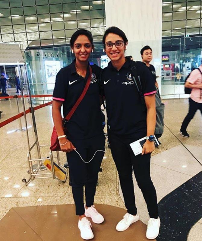 Smriti Mandhana with Harmanpreet Kaur at the airport ahead of the Asian Games in Malaysia in May 2018