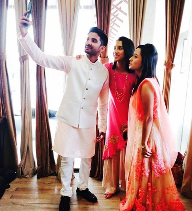 Smriti Mandhana with her brother and his wife: She captioned the photo: Welcome to the family Bhabhi! #BhaiyaBhabhi