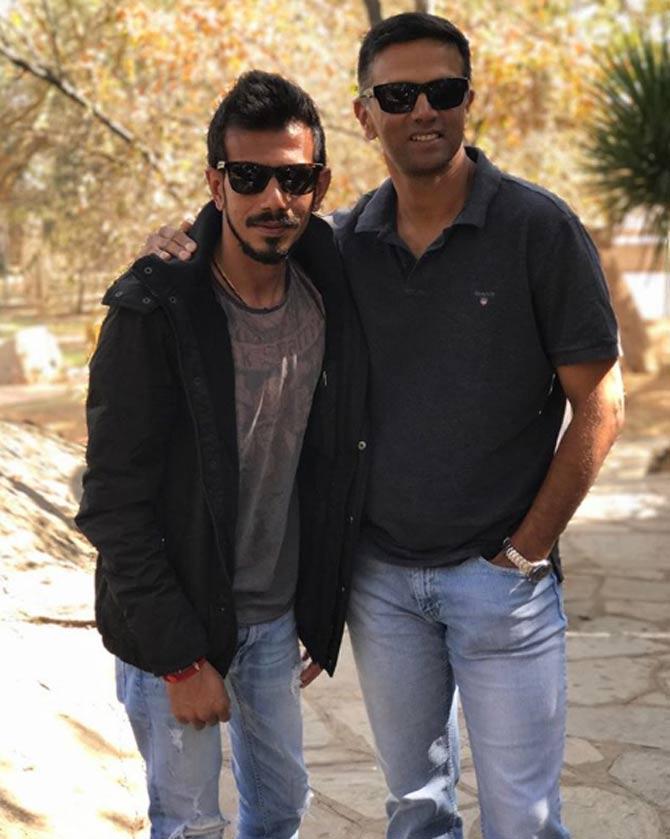 Yuzvendra Chahal is a right-arm leg break bowler. His spin-bowling partnership with Kuldeep Yadav has won many matches for India in the last couple of years In Picture: Yuzvendra Chahal with Rahul Dravid