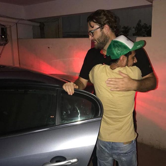 Yuzvendra Chahal hugging former New Zealand captain Daniel Vettori, he captioned Hate to say good bye thanks bangalore for lovely 4 years thanks for your support and love, miss you all going with so many memories, RCB for life #delhi  