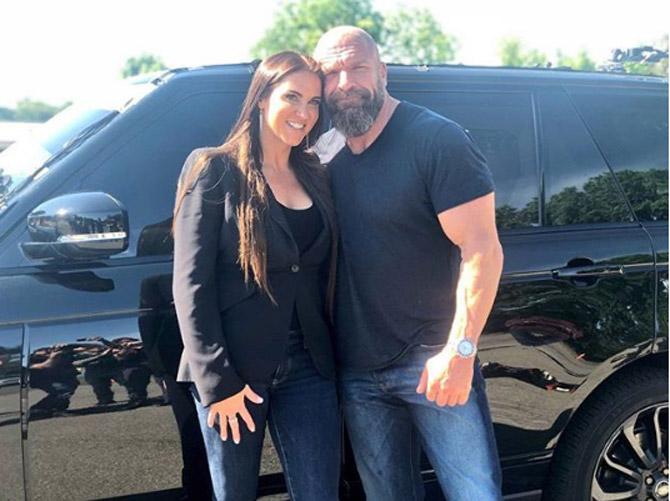Triple H and Stephanie McMahon began their relationship on television in late November of 1999. In reel life, Stephanie's character was set to marry Test, but Triple H interrupted the 'wedding' to reveal that he (kayfabe) kidnapped her, and tricked a Las Vegas chapel attendant to sign their wedding papers. In real life, Triple H and Stephanie McMahon's marriage was officially legitimized on 25th October, 2003.