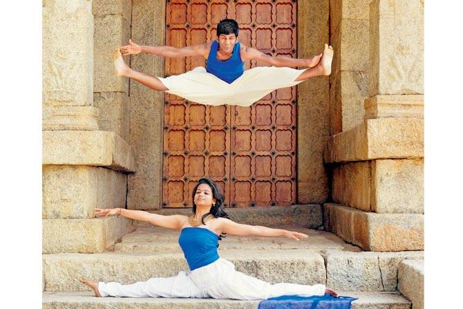 Anand Dhanakoti performs a dance routine along with a partner