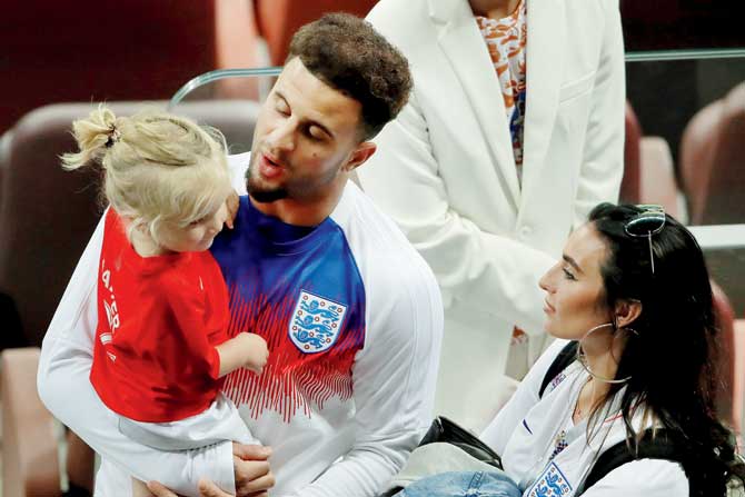 Kyle Walker with Annie Kilner and his daughter 