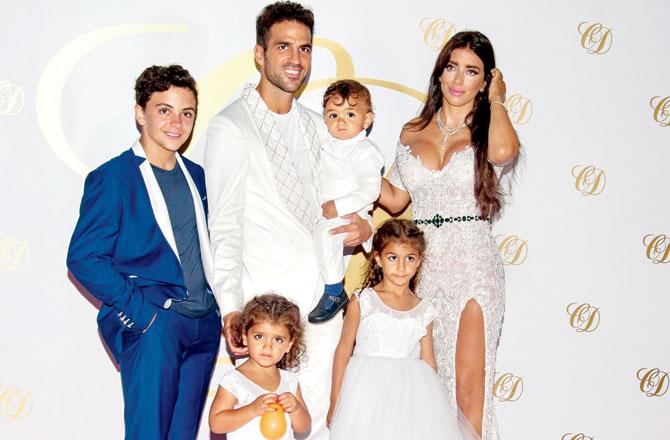 Cesc Fabregas, his wife Daniella Semaan and their kids, (left to right) Joseph, Capri, Lia and Leonardo (in arms) during the wedding party in Ibiza, Spain. Pic/Getty Images