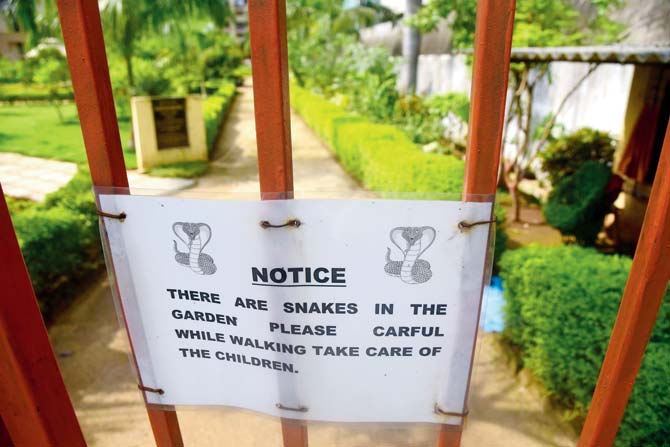A sign put up by BMC warns of snakes inside Swami Samarth Manoranjan garden