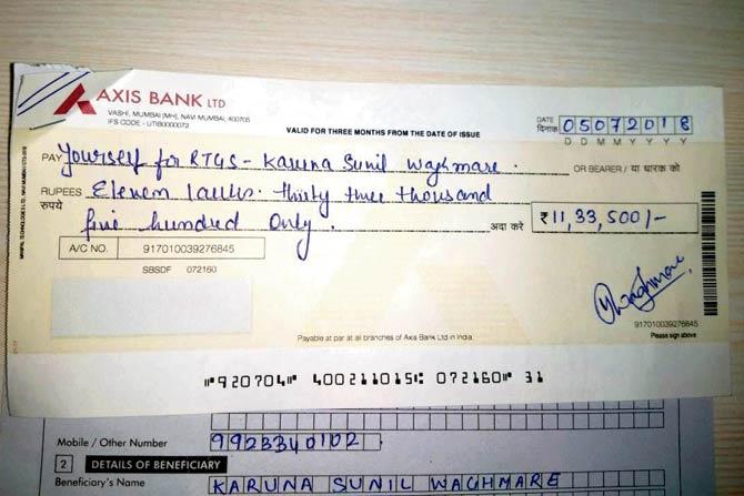 The cheque given to Karuna, wife of Sunil Waghmare