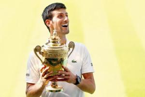 Wimbledon: Novak Djokovic beats Kevin Anderson 6-2, 6-2, 7-6 