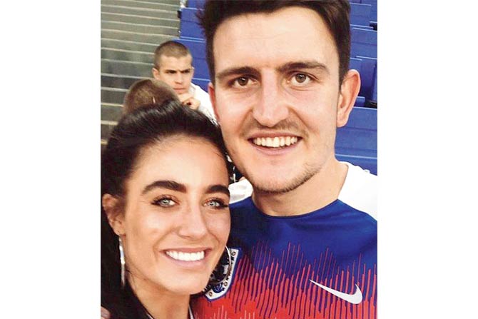 England defender Harry Maguire with girlfriend Fern Hawkins