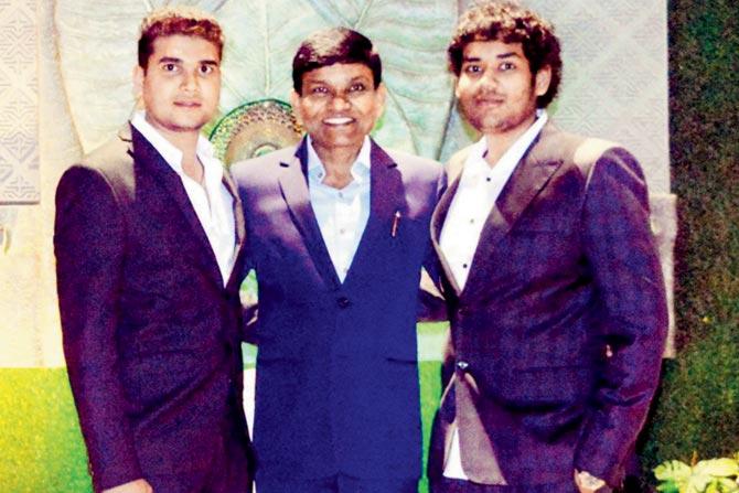 Jayantilal Gada with sons Dhaval (left) and Akshay