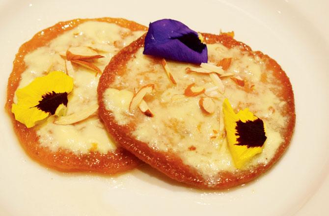 Mal pua: Our heart sinks when we get our thick pancake-like mal puas, with just a gentle slather of rabri. We need more of the malai