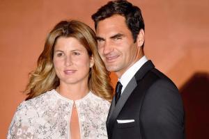 Roger Federer is happy with four kids for the time being