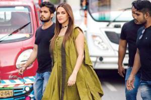 Neha Dhupia walks to event after her car gets stuck in a traffic jam