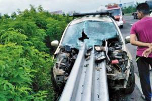 Pune: 4 injured as they drive into security railing on expressway