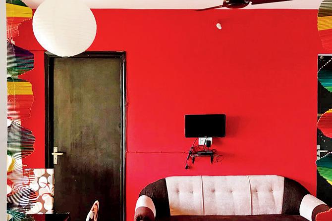 Rohit Purohit revamped the flat to include red walls