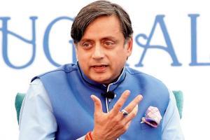 BJYM workers throw black oil at Congress MP Shashi Tharoor's office