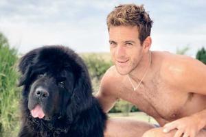 Juan Martin del Potro with his pet dog Cesar