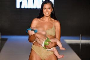 Swimsuit model Mara Martin breastfeeds her baby on ramp and Twitter goes crazy!
