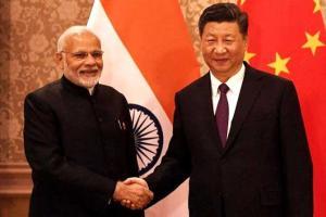 Narendra Modi-Xi Jinping agree to maintain 'momentum' in ties