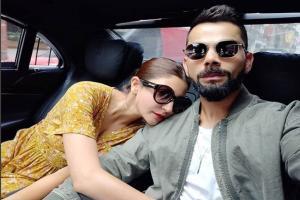 Virat Kohli and Anushka Sharma get cosy in a car