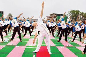 World Yoga Day: Narendra Modi performs yoga with 50,000 participants