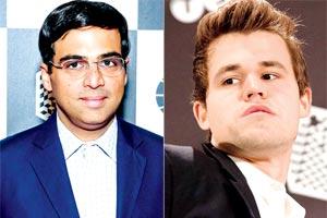 Viswanathan Anand holds wily Magnus Carlsen to stay in contention at Norway