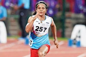 Sprinter Dutee clinches gold, betters own national record