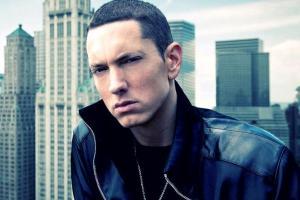 Eminem accused of using gunshot sound effects at concert, rapper denies