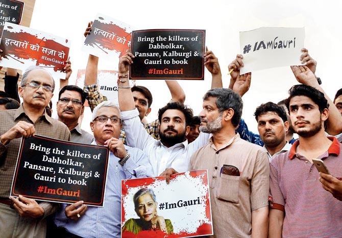 Activists take part in a protest rally against the killing of journalist Gauri Lankesh at the India Gate memorial, on Sept 6, 2017. File Pic/AFP
