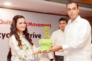 Dia Mirza receives sapling from Milind Deora as apart of 'Quit Plastic Movement'