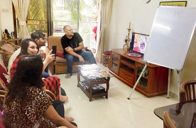 Artist Abhijeet Kini (extreme right) conducts a comic-making workshop at his Santacruz home 