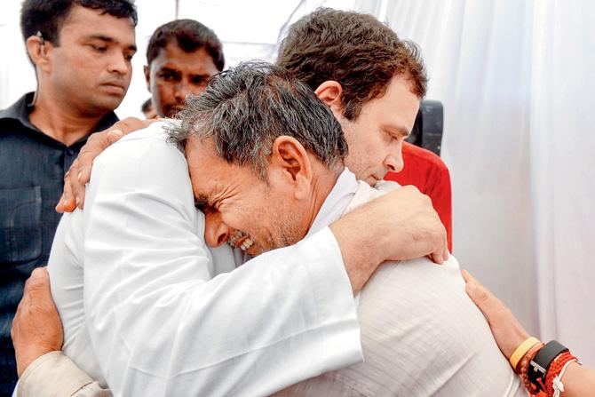 Rahul Gandhi consoles the family member of a farmer, killed in the police firing in the 2017 farmers