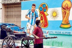 Lionel Messi's fan, a tea-seller, paints his Kolkata house in Argentina colours