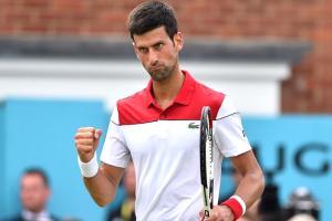 Novak Djokovic starts strong at Queen's with a 6-2, 6-1 win against John Millman