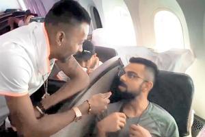 Hardik Pandya chats up with teammates mid-air
