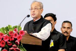 Congress, RSS trade charges over Pranab Mukherjee's fake picture