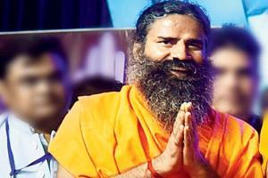 Baba Ramdev conducts yoga session in Tihar jail