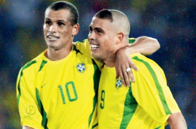 Brazilian striker Ronaldo (right) celebrates his goal v Germany with Rivaldo during the 2002 World Cup tie in Japan