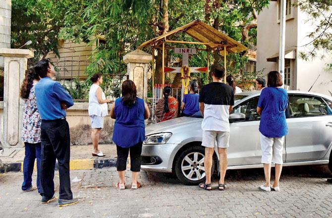A prayer service at a cross inside the society