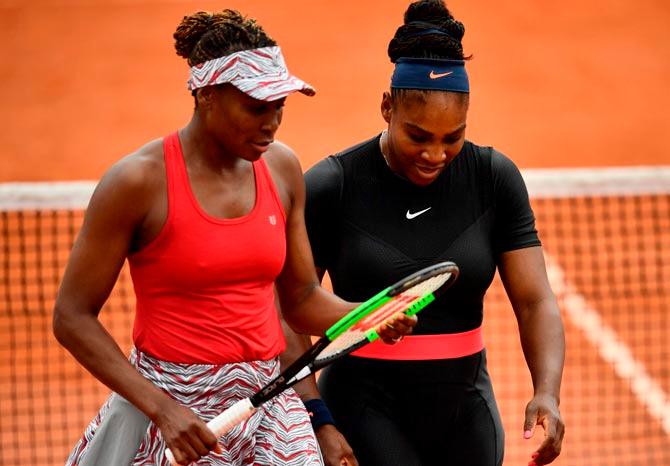 Serena Williams and sister Venus. Pic/AFP